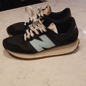 New Balance Black and Light Blue Sneakers